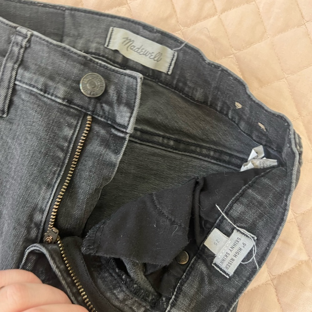 Madewell distressed black skinny jeans. Size 25.
